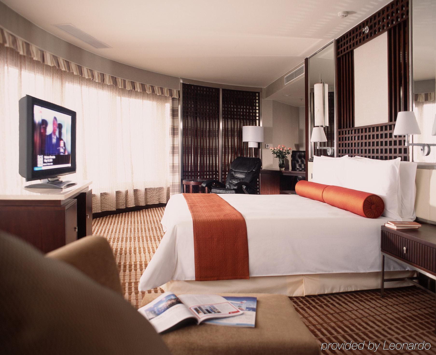 Hotel Nikko טיאנג'ין מראה חיצוני תמונה A bedroom at the hotel
