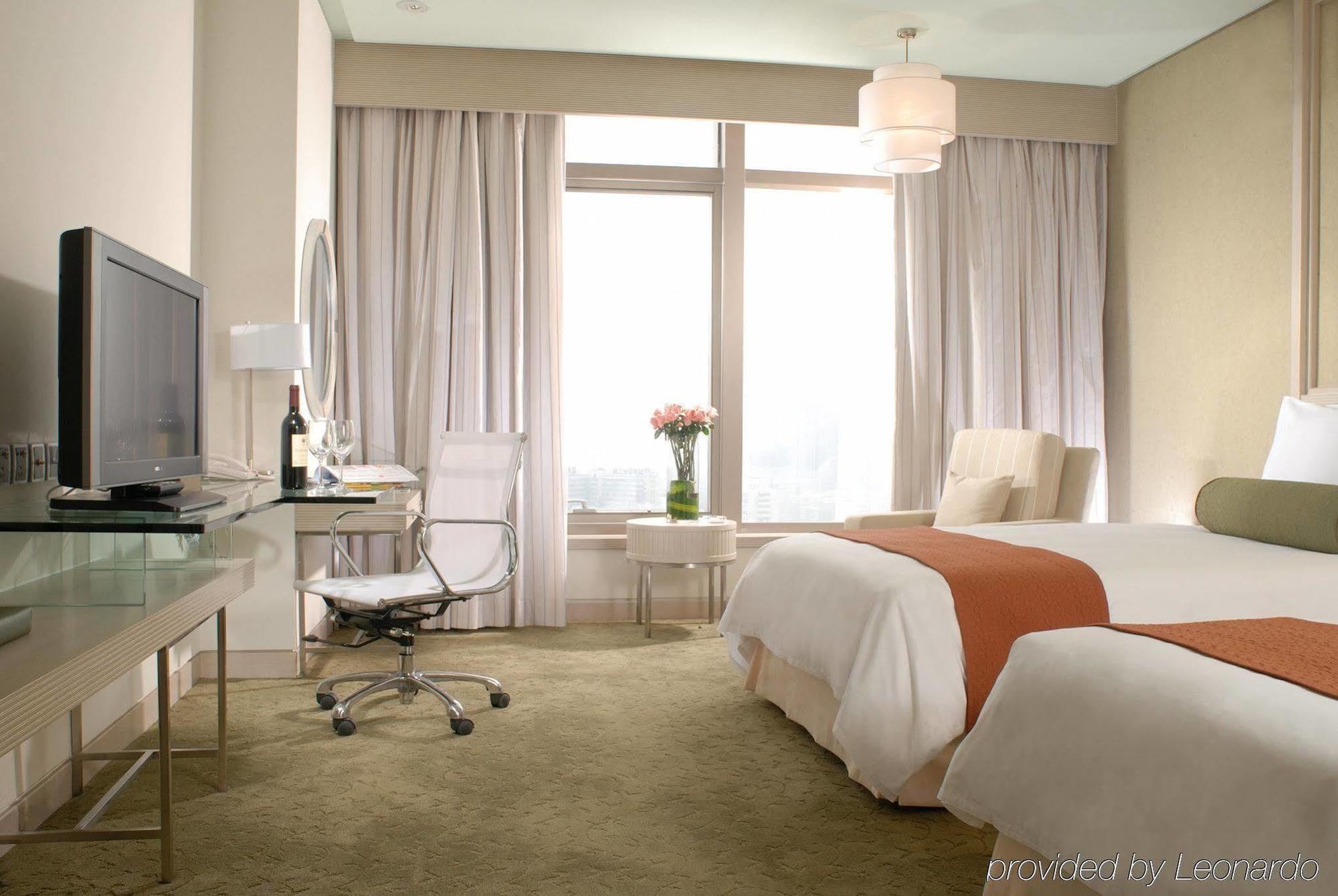 Hotel Nikko טיאנג'ין חדר תמונה A room at the hotel
